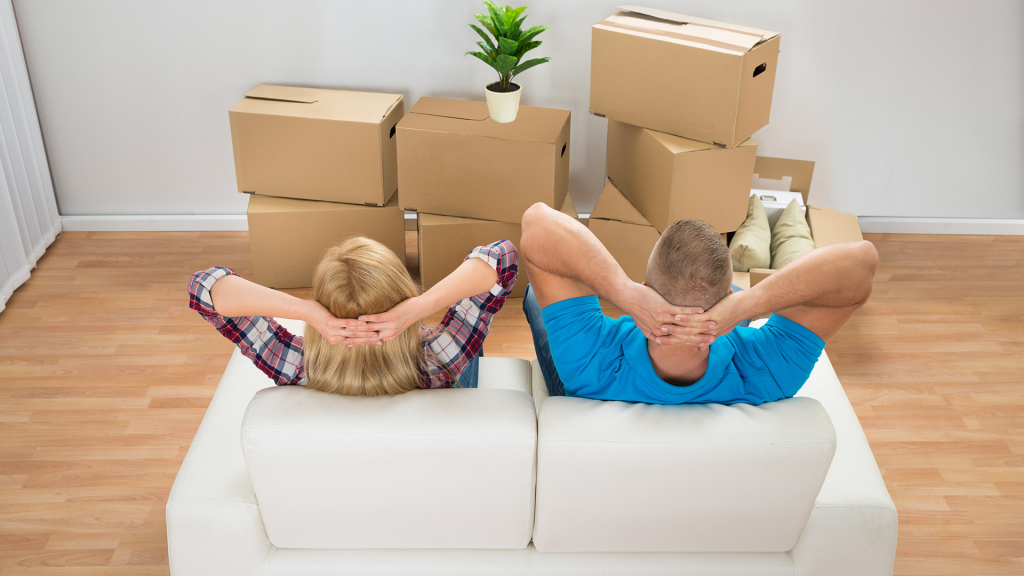 Couple moving to luxury apartment in Montreal